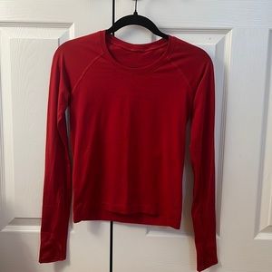 red lululemon long sleeve shirt